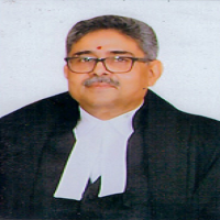 Hon’ble Mr. Justice Rakesh Kumar, Member (Judicial)